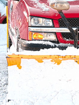 commercial snow plowing black diamond landscapes truck with yellow snow plow attached