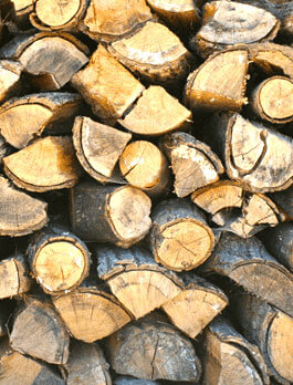 delivery and stacking firewood chopped and split stacked logs black diamond landscapes
