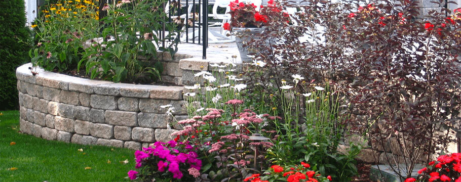 landscape construction retaining wall flowers garden lawn patio in arlington massachusetts