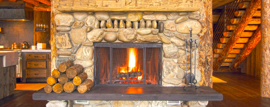 lit fireplace in cozy home with firewood in arlington massachusetts seasoned kiln dried and deliver stacking